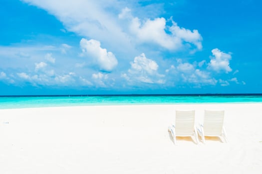 Tropical beach on the Maldives island photo