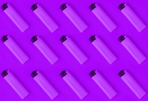 Repeating ligthers in rows. Creative concept texture pattern image. photo