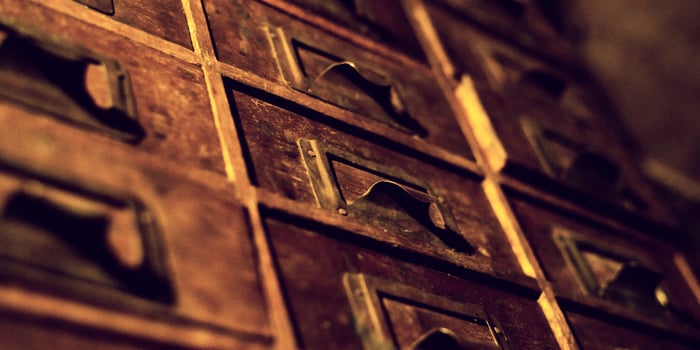Old wooden wardrobe with small drawers photo