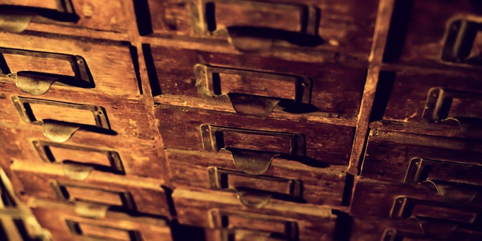 Old wooden wardrobe with small drawers photo