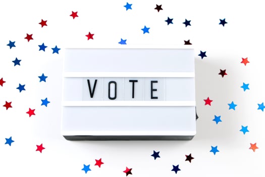 The word vote on white background photo