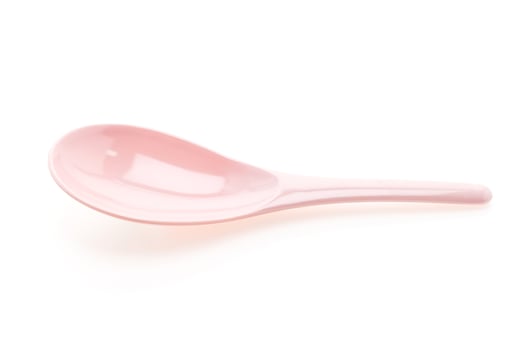 Plastic ladle spoon isolated on white background photo