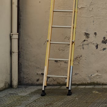 Old ladder on the wall photo
