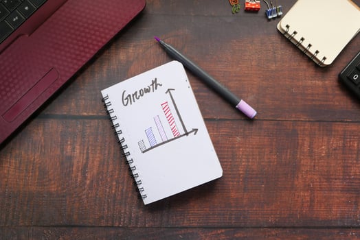 Growth chart on a notepad photo