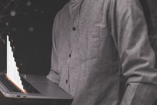 Laptop shows a hologram stock photo