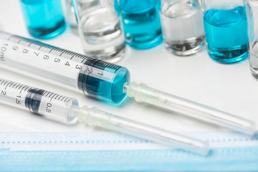 Syringe with vaccine photo