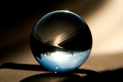 Landscape seen through the lens ball. photo