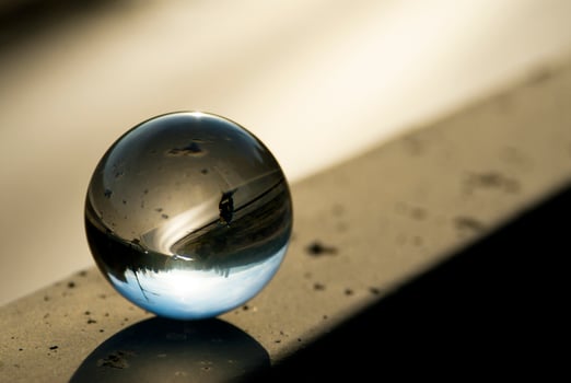Landscape seen through the lens ball. photo