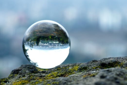 Landscape seen through the lens ball. photo