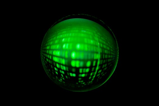 An abstract sphere with a blurry pattern isolated on black background. photo