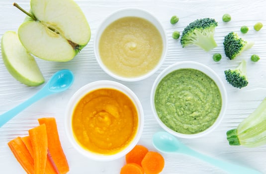 Assortment of fruit and vegetable puree photo