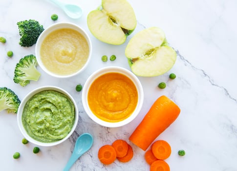 Assortment of fruit and vegetable puree photo