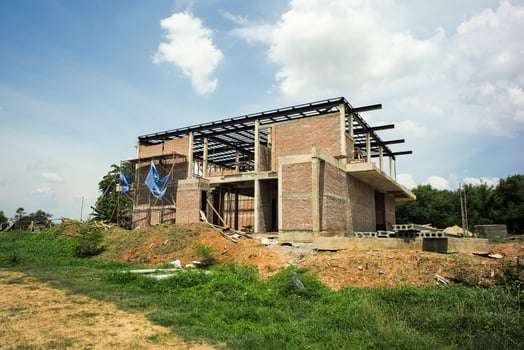Landscape of house under construction with clear sky photo