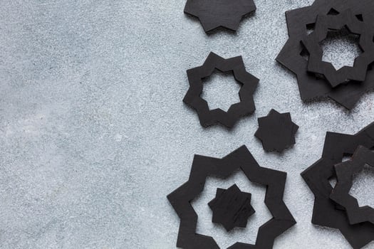 Black Islamic decorations on a gray background photo