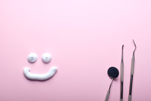Dental tools in simple dental health concept photo