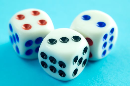 Dice on blue background photo