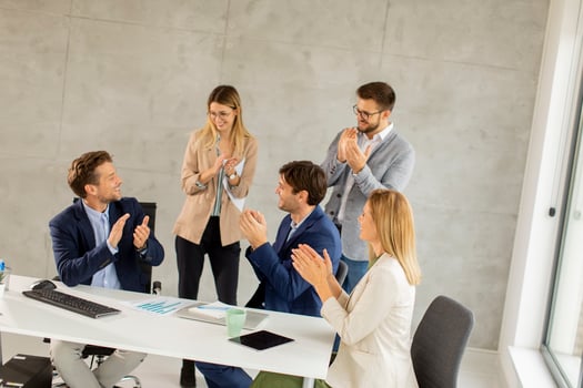 Group of professionals clapping photo
