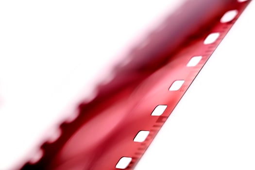 A blurry film strip on white background photo