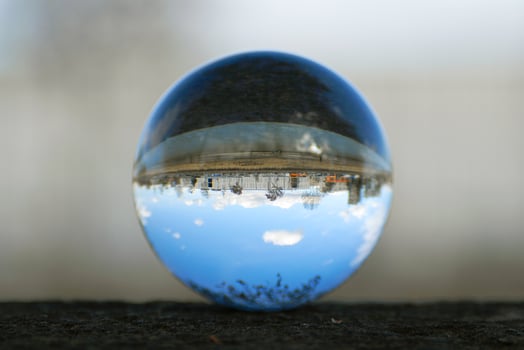 Street view through the lens ball photo