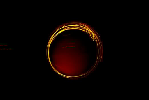 Burning sphere on black background photo