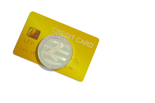 Litecoin and credit card isolated on white background. photo