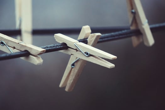 wooden clothespin on the rope photo