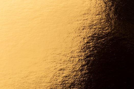 Abstract texture of golden metal photo