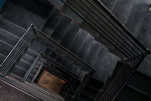 Square steel stairwell view from the top photo