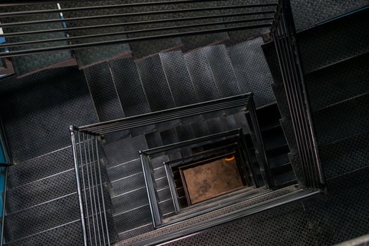 Square steel stairwell view from the top photo