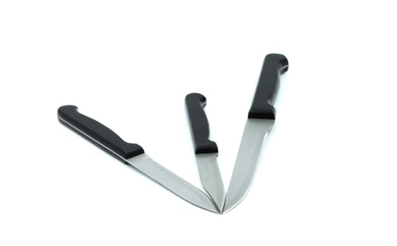 Kitchen knives on white background photo