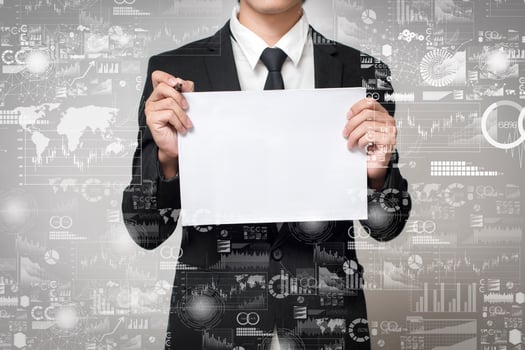 businessman holding paper with graph photo
