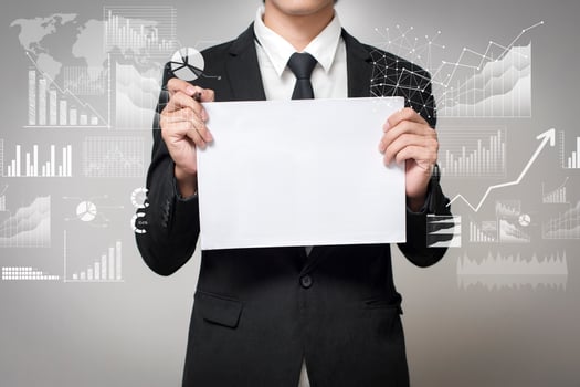 businessman holding paper with graph photo