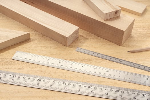 Group of assorted Wood material with professional rulers Carpentry timber measuring or woodwork concept photo