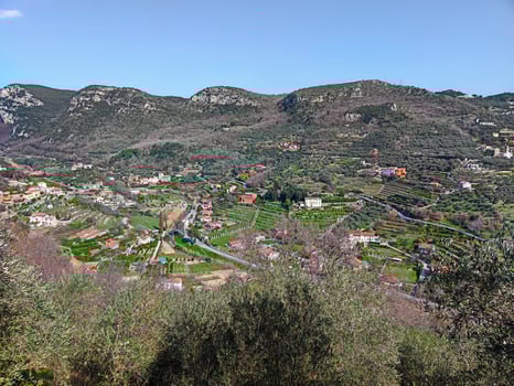 Finale Ligure, coastal landscape with fields and mountains photo