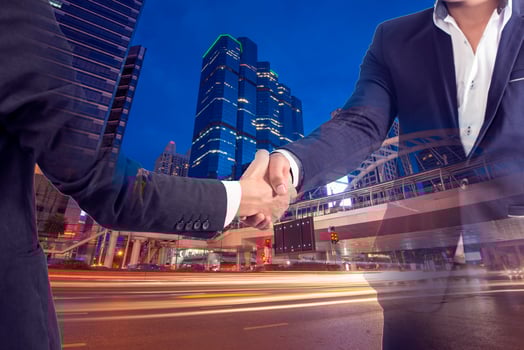 Business people on cityscape background photo