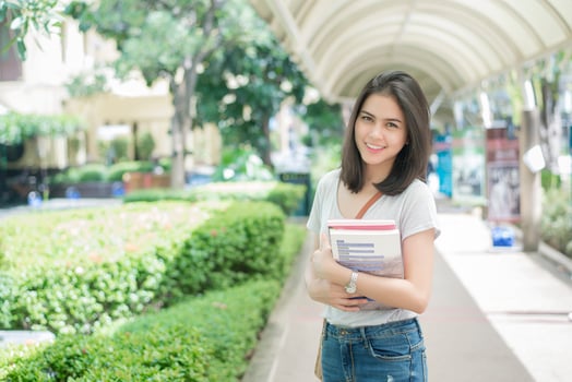 A portrait of an Asian university student on campus photo