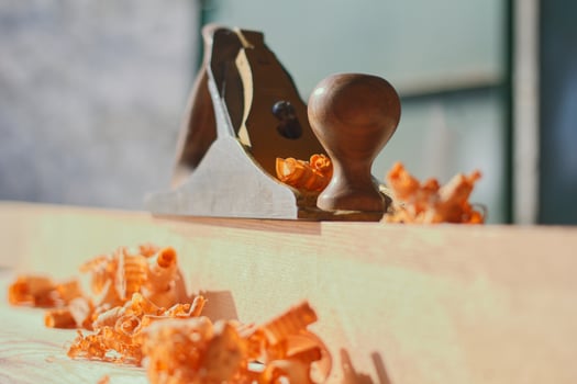 Plane and shavings wallpaper photo