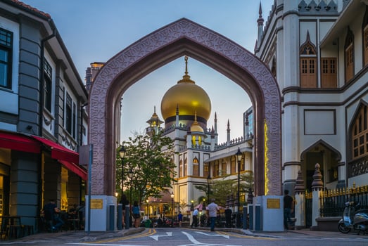 Street and Sultan Masjid at night in Singapore photo