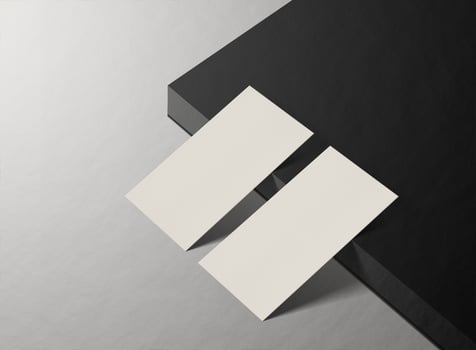 Luxury business card mockup isolated on dark floor background. photo