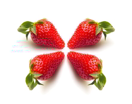 Two strawberries close up on white background photo