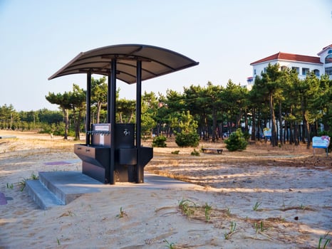 Water column on the beach of Yangyang city, South Korea photo