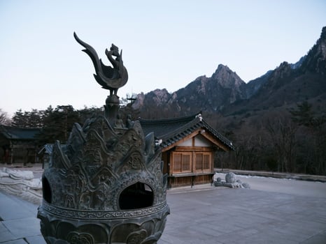 Cock sculpture in in Sinheungsa Temple. Seoraksan National Park. South Korea photo