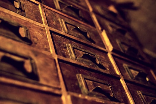 Old wooden wardrobe with small drawers for storing letters, vintage retro-safe, exclusive 19th century handmade mini-wardrobe photo