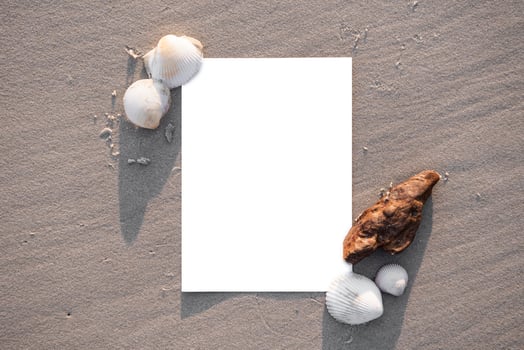 Blank piece of paper on the beach photo
