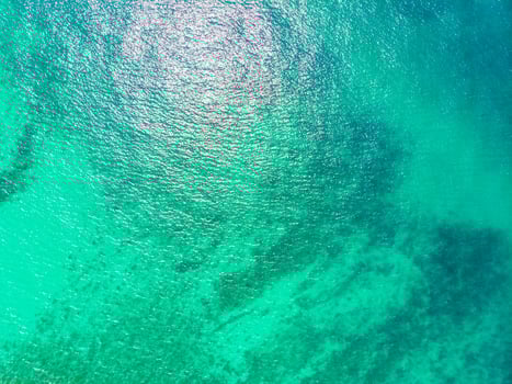 Aerial view of beautiful beach and sea with coconut palm tree photo