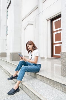 University student is holding tablet photo