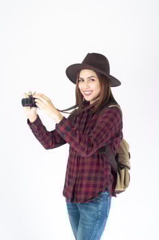 Beautiful traveller woman on white background photo