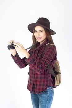 Beautiful traveller woman on white background photo