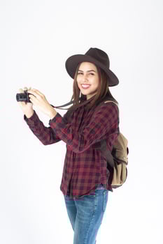 Beautiful traveller woman on white background photo