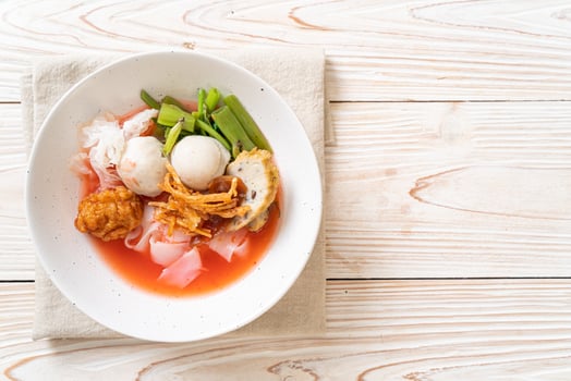 Yen-Ta-Four - Thai Style Noodle with assorted tofu and fish ball in Red Soup - Asian food style photo